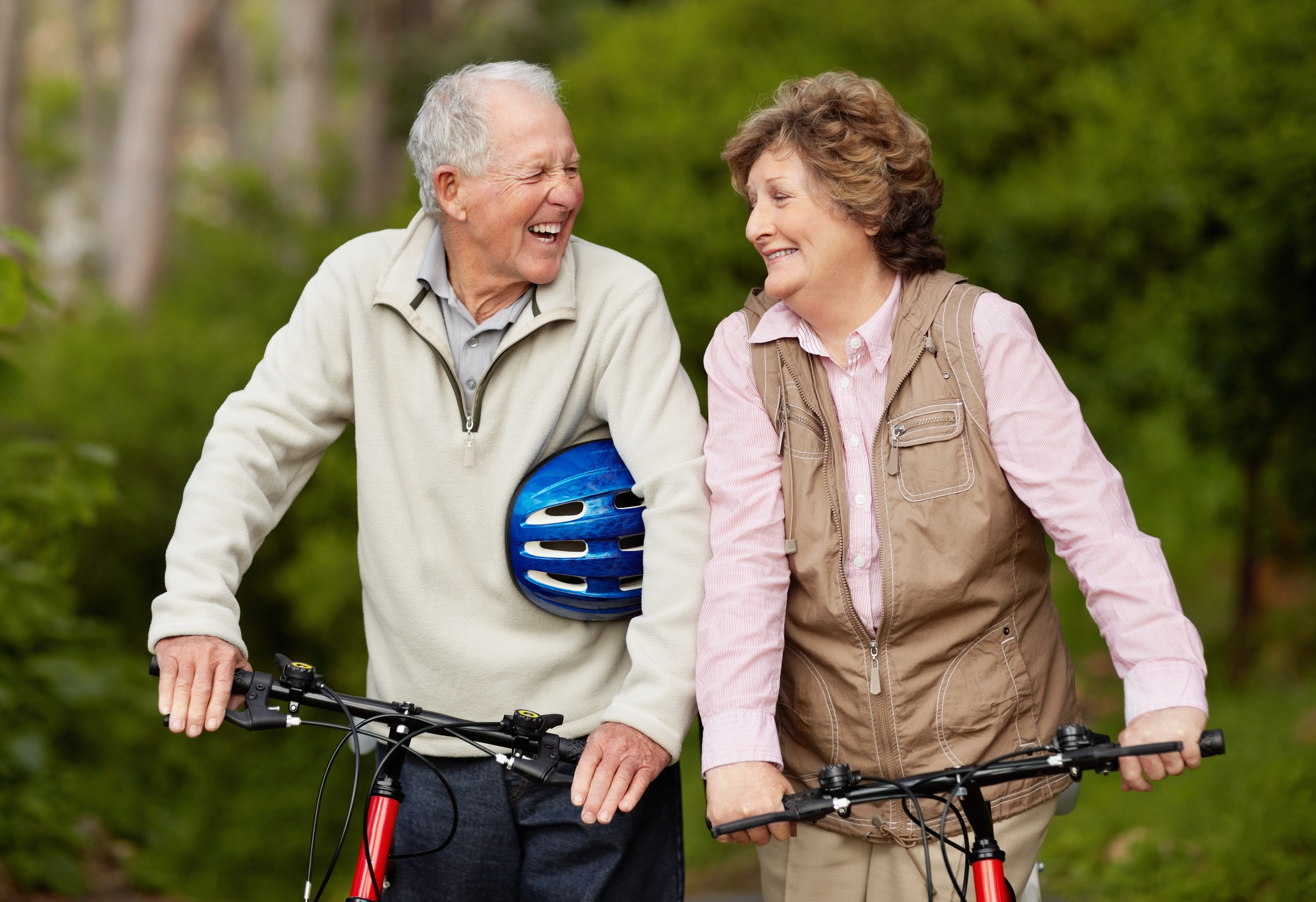 Senior couple taking a bike ride