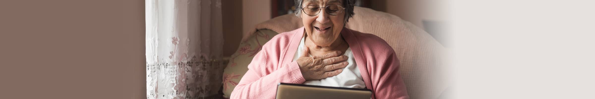 Senior women on her tablet