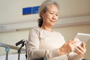 Senior-women-looking-at-her-tablet