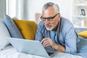 Senior0man-looking-at-his-laptop