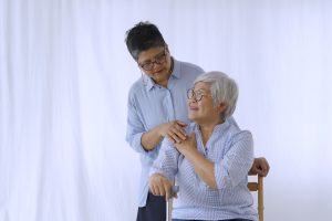 Caregiver comforting senior